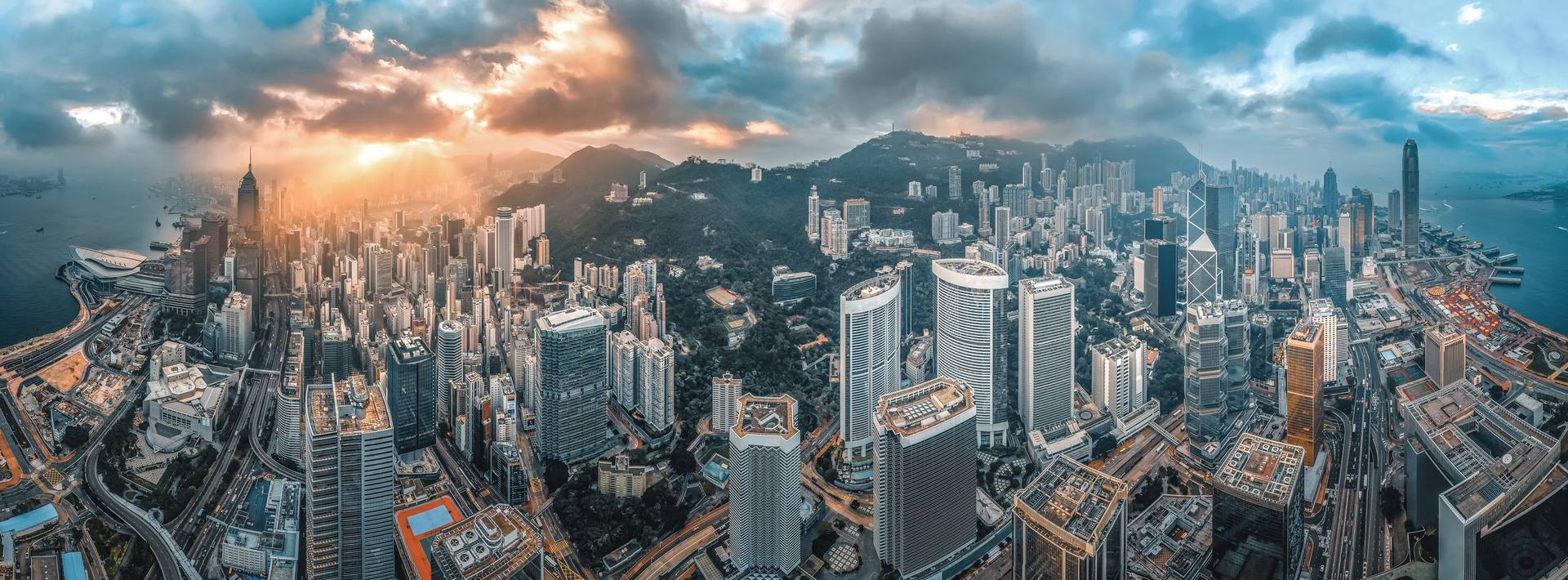 Dense skyline of an international financial city at sunrise